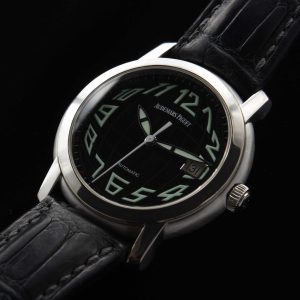 This is an uncommonly found Audemars Piguet model known as the 'Jules'; housed in a heavy 39mm 18k-white-gold case, 15mm thick and 44mm lug-to-lug.
