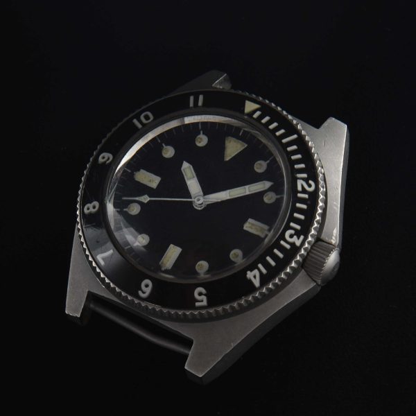 This is an original 1970s Benrus Type 1 "Sterile" vintage watch. The wording "sterile" comes from the rumors that these watches with only the serial numbers on the case-back were worn by covert operators, such as CIA operatives.