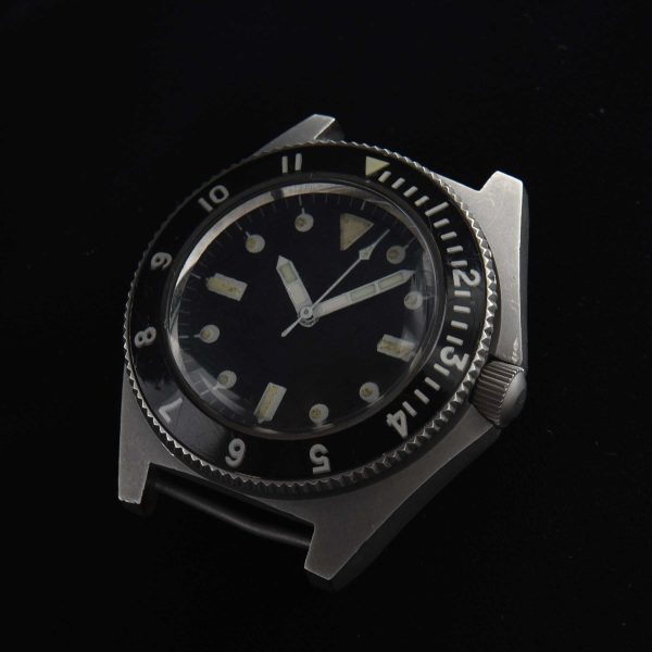 This is an original 1970s Benrus Type 1 "Sterile" vintage watch. The wording "sterile" comes from the rumors that these watches with only the serial numbers on the case-back were worn by covert operators, such as CIA operatives.
