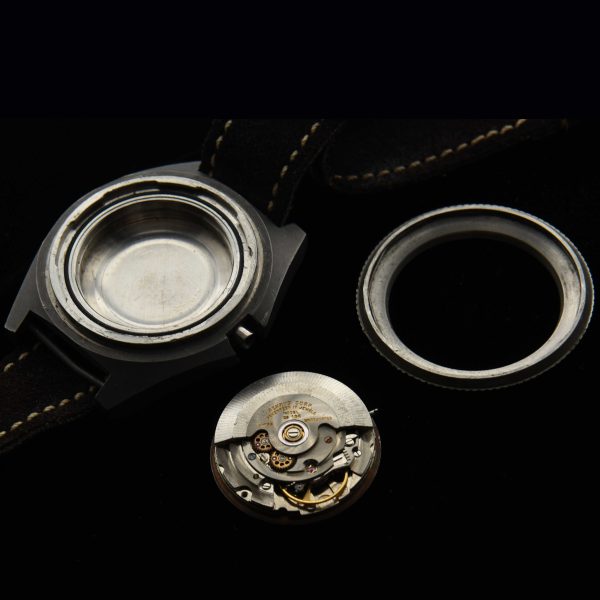 This is an original 1970s Benrus Type 1 "Sterile" vintage watch. The wording "sterile" comes from the rumors that these watches with only the serial numbers on the case-back were worn by covert operators, such as CIA operatives.