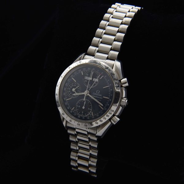 This 39mm stainless steel Omega Speedmaster triple-date chronograph checks all the boxes.