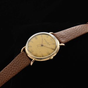 This IWC Schaffhausen in 18k-rose-gold dating to the 1950s looks fabulous with its amazingly aged original dial.