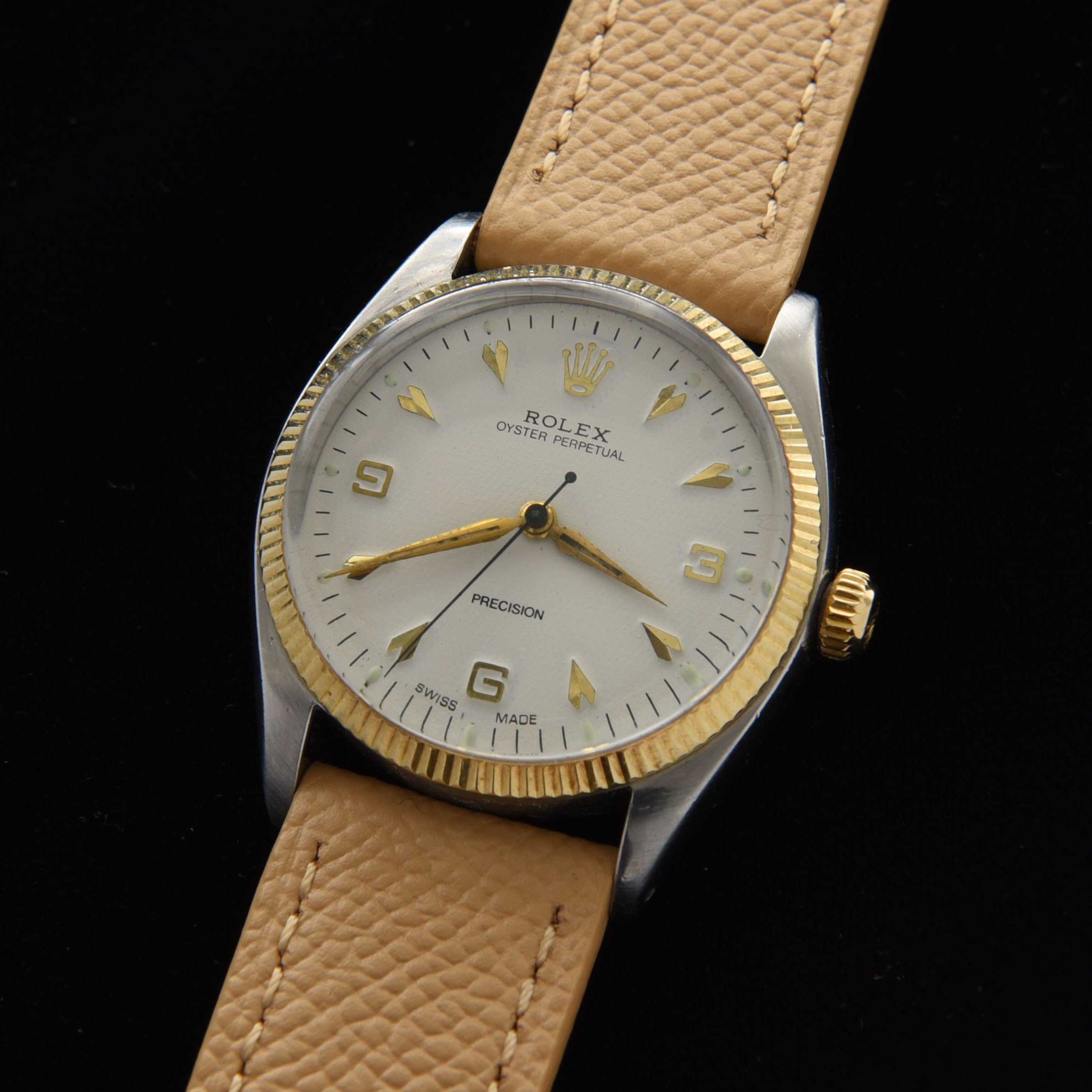 This 34mm Rolex Oyster Perpetual was recently serviced and operating perfectly. The automatic-winding caliber 1530 movement alone is worth $2500.