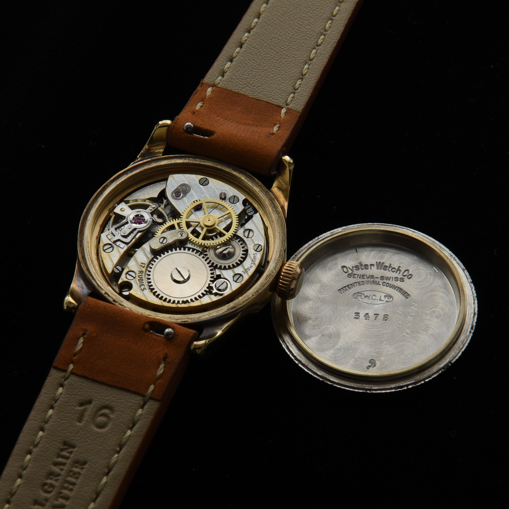 This is a circa-1942 Oyster made by Rolex for soldiers going overseas in WW2 and sold at the PX stores in Canada. The original caliber 59 manual winding movement was marked Rolex under the dial only, and not on the bridge.