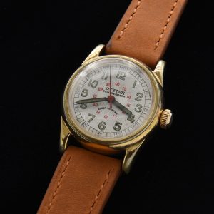 This is a circa-1942 Oyster made by Rolex for soldiers going overseas in WW2 and sold at the PX stores in Canada. The original caliber 59 manual winding movement was marked Rolex under the dial only, and not on the bridge.