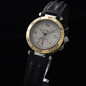 This is a fine 38mm circa 1998 Cartier Pasha with a power reserve indicator. The dial above 6 o'clock indicates how many hours of winding is remaining on the mainspring.