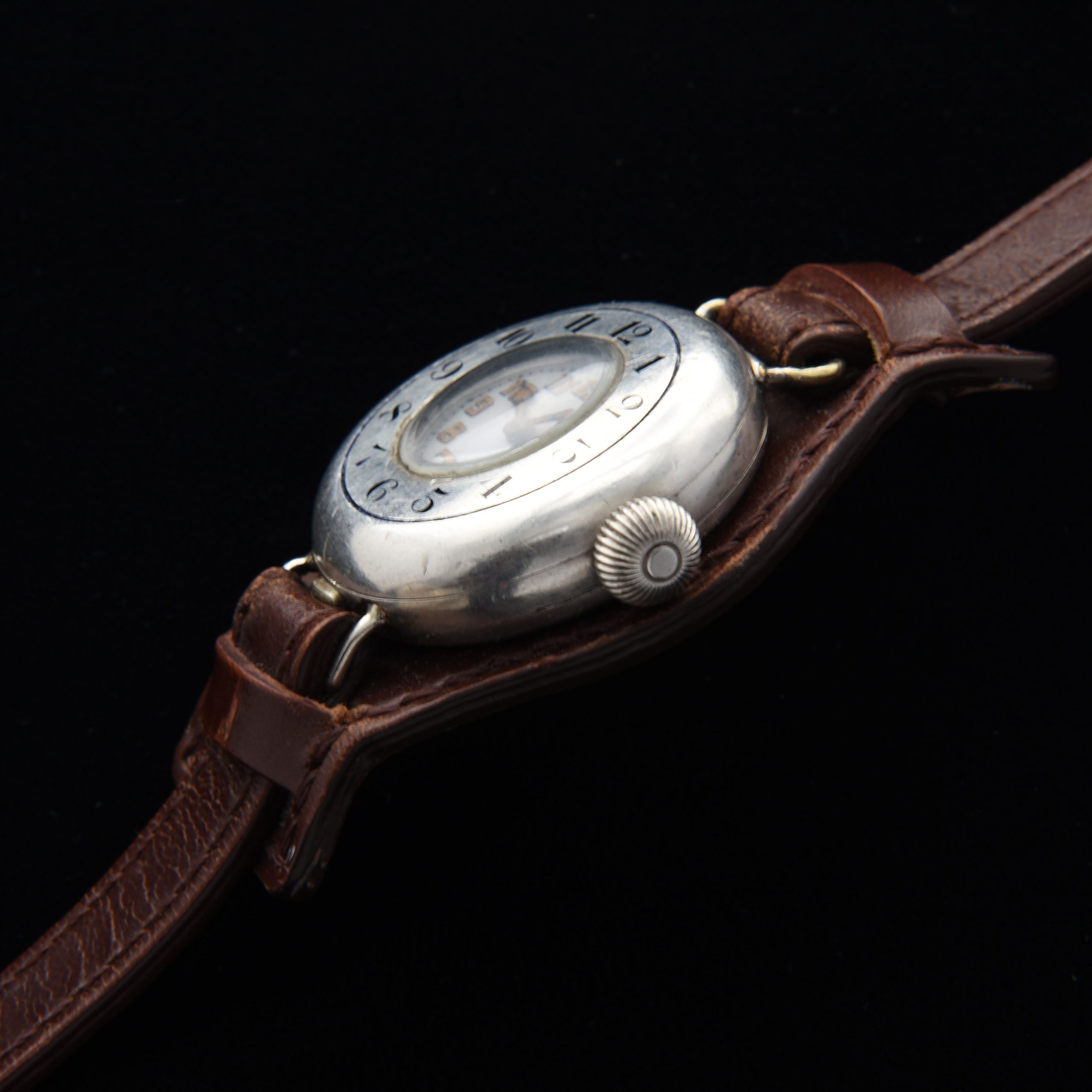 This is a very rare WW1 era 1917 vintage Rolex Sterling-Silver-half-hunter-hinged-case watch measuring a large 35mm and looking incredible! The case is all properly signed "Rolex". The Sterling-silver case with enamel-inset numerals has survived amazingly well; remaining in fabulous condition.