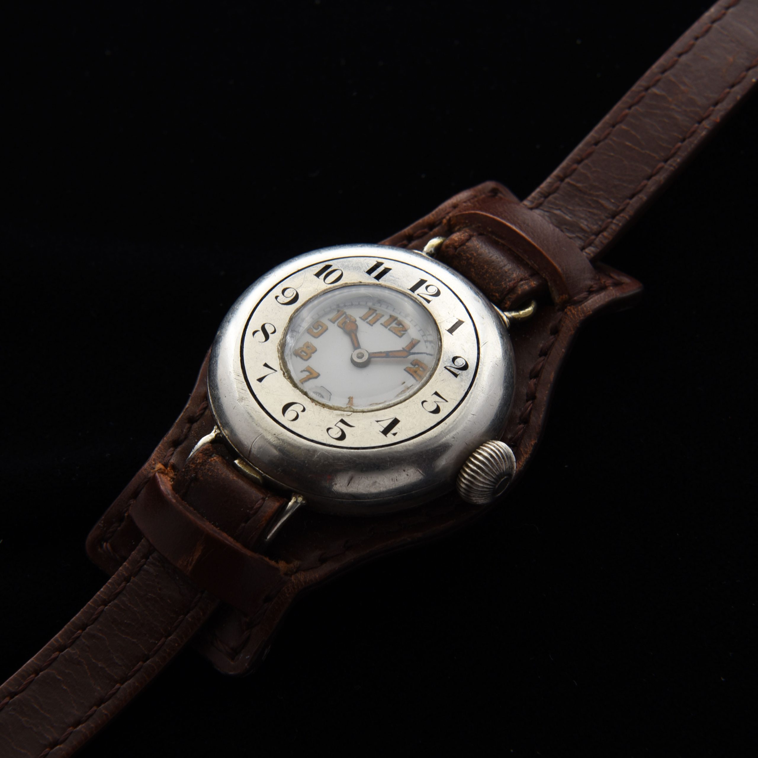 This is a very rare WW1 era 1917 vintage Rolex Sterling-Silver-half-hunter-hinged-case watch measuring a large 35mm and looking incredible! The case is all properly signed "Rolex". The Sterling-silver case with enamel-inset numerals has survived amazingly well; remaining in fabulous condition.