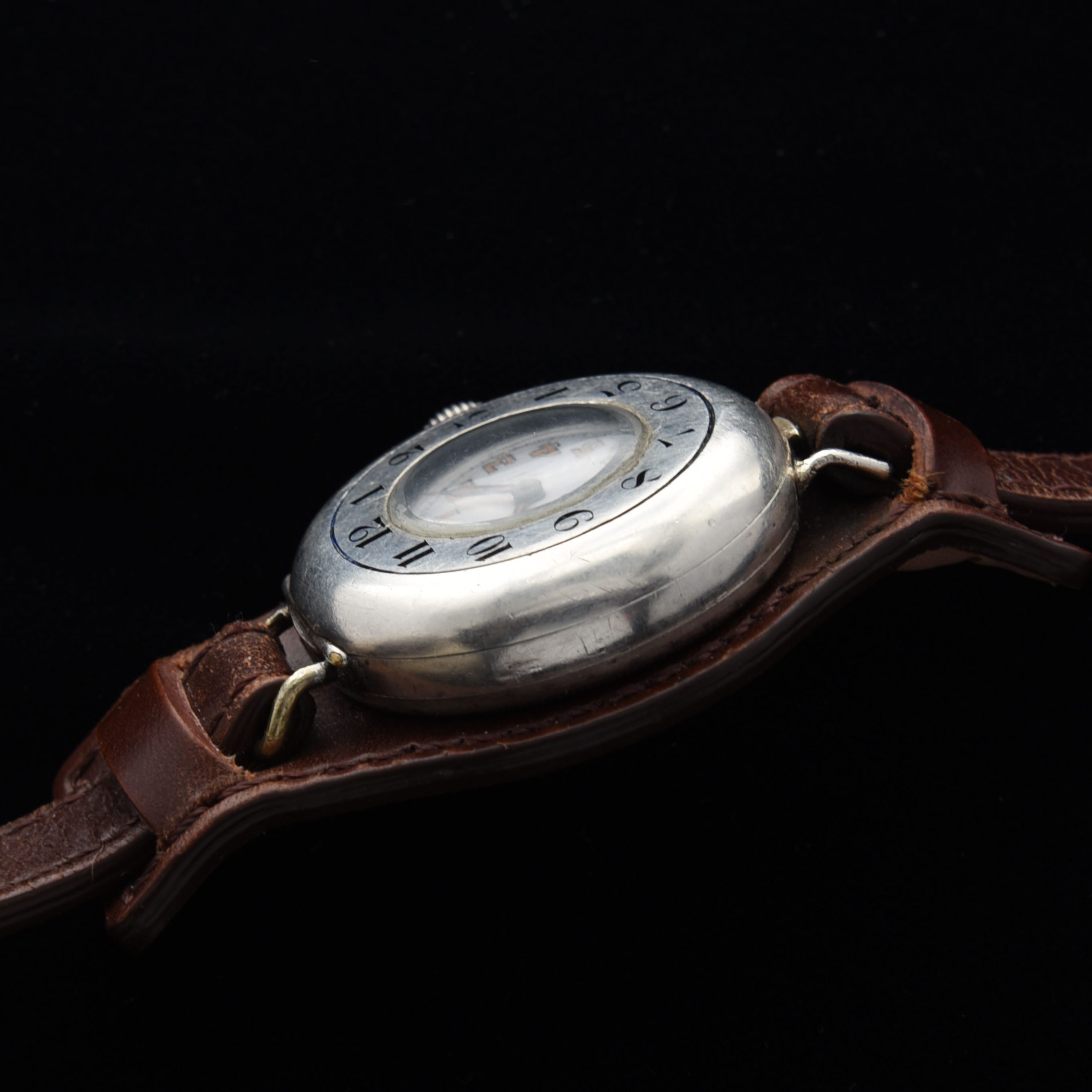 This is a very rare WW1 era 1917 vintage Rolex Sterling-Silver-half-hunter-hinged-case watch measuring a large 35mm and looking incredible! The case is all properly signed "Rolex". The Sterling-silver case with enamel-inset numerals has survived amazingly well; remaining in fabulous condition.